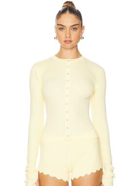NWT.  Lioness.  Small top and bottom.  Scalloped edging.  Powder yellow